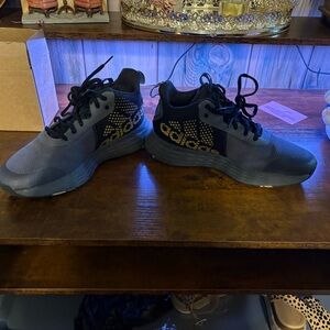 Adidas Black Sneakers with Gold Details